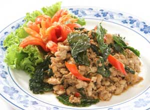 plate of chicken cooked with Holy Basil over rice